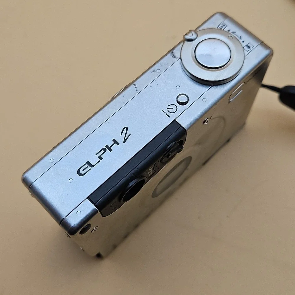 Canon ELPH 2 Camera Zoom Lens Silver UNTESTED AS IS FOR PARTS
